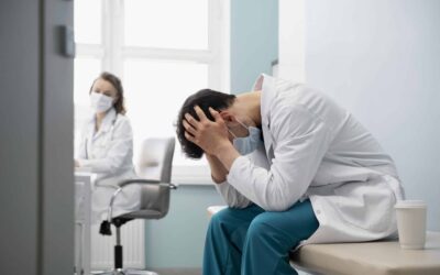 This is an image of a doctor who broke down crying outside the hospital after losing a 19-year-old patient.