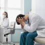 This is an image of a doctor who broke down crying outside the hospital after losing a 19-year-old patient.